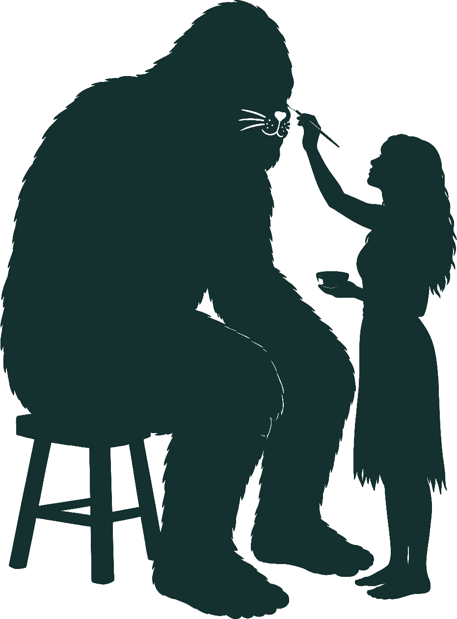 The Yowie sitting patiently on a small stool while a child paints whiskers on its face